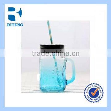 Glass beverage/ fruit juice / milk bottle with straw