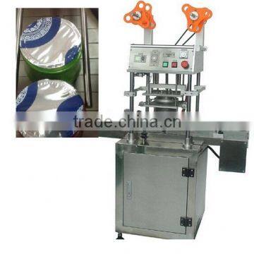 Linear 4 head aluminum foil heat sealing jar machine