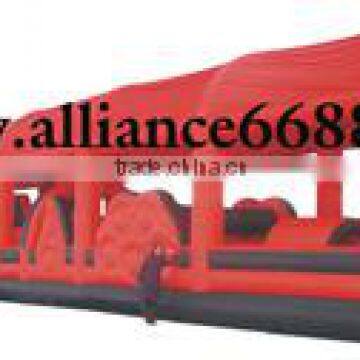 Barrier slide inflatable obstacle