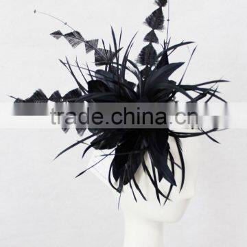 Navy feather fascinator on headband