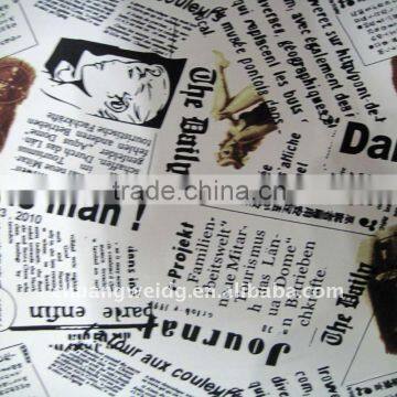 100% polyester textile fabric with newspaper print