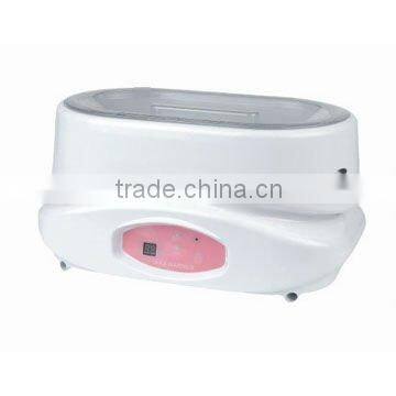 professional hands and facial care use paraffin wax warmer