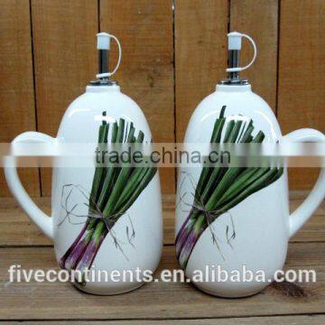 white with green vegetable decal ceramic oil and vinegar bottle holder