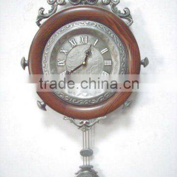 Pendulum antique bronze wall clock