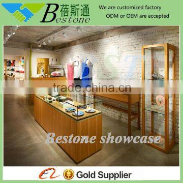 Varnish women clothing store display furniture with wooden showcase