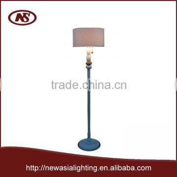 Rubber wood floor lamp with rubber wood base and linen fabric shade