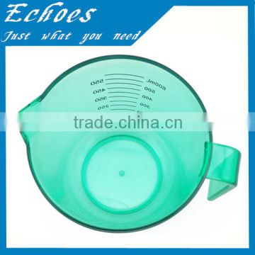 Green plastic food measure jug