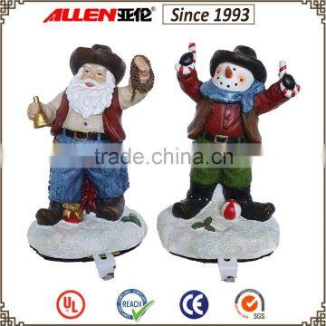 5.9" christmas santa claus and snowman resin cowboy statue christmas stocking holder stand