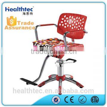 red old style salon barber chair hydraulic pump