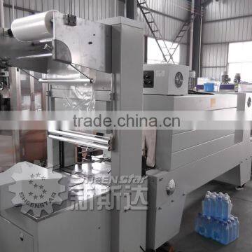 Automatic PE film wraping and shrinkage machine