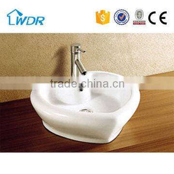 Special heart shape above counter mounting ceramic washing basin