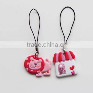 Toy pendant lions and house