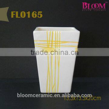 White ceramic cylinder pot