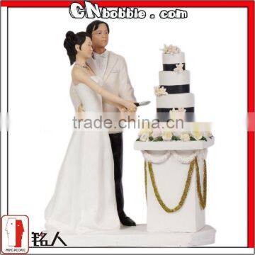 Polyresin cake decorating figurine