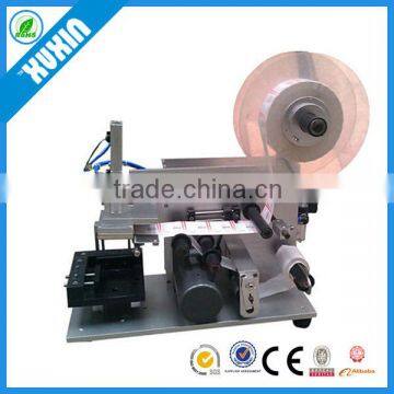 Semi-automatic Flat Labeling Machine X-60; Flat labeling machine for carton; flat glass bottle; Square bottle