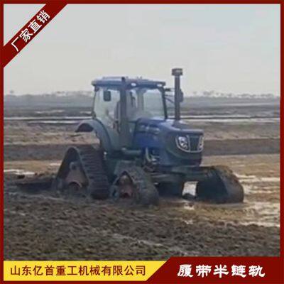 Tractor modification with track chassis, anti-skid and anti sinking measures in muddy and paddy fields