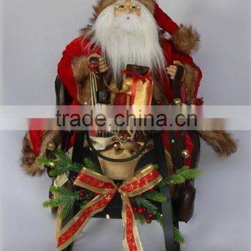 XM-CH1586 28 inch lighted santa sitting in sleigh for christmas decoration