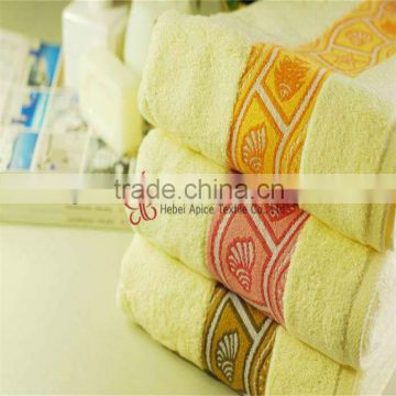 wholesale pure cotton bath towel / yellow bath towels