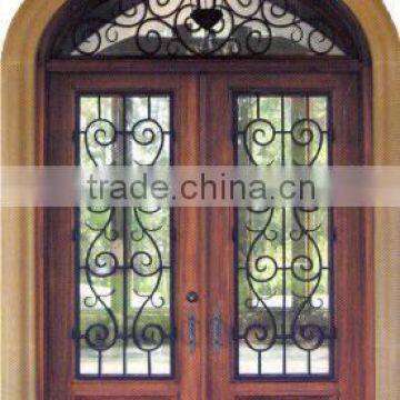 double exterior wrought iron door with transom