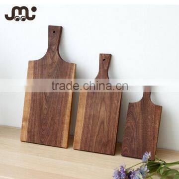 Rustic one piece walnut wooden paddle cutting board