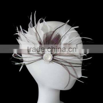 Woman feather bridal fascinator on metal clip