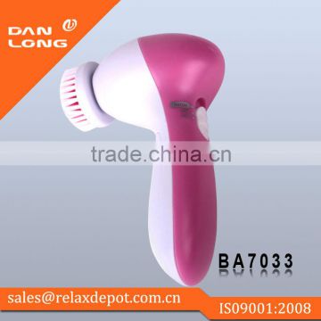 Rotary brush facial cleaning instrument with 4 massager heads