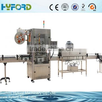 Sleeve shrinking labeling machine