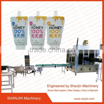 Automatic stand up pouch filling machine/automatic chocolate jam pouch filling capping machine