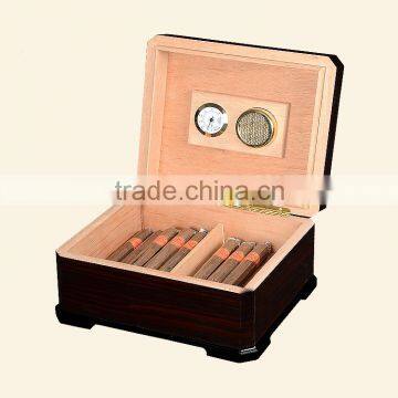 Wooden cigar humidor, packing cigarettes and cigars