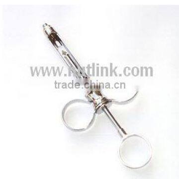 Dental Two Ring Syringe silver and goldan