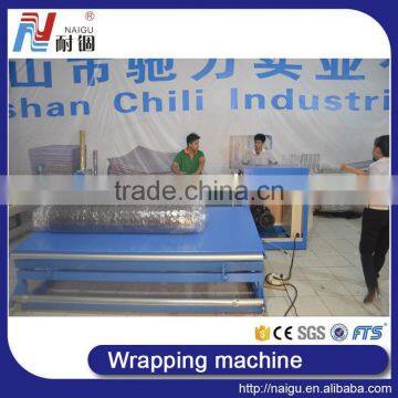China Foshan NaiGu Factory Semi Automatic Mattress Roll Wrapping Machine photo-6