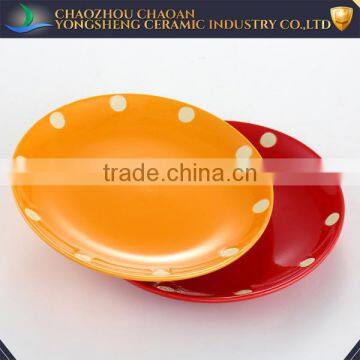 Red and yellow ceramic disposable plates for restaurant