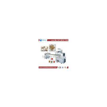 TK-Z880 CANDY PILLOW PACKING MACHINE