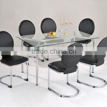 Glass dining table ans u shape chairs