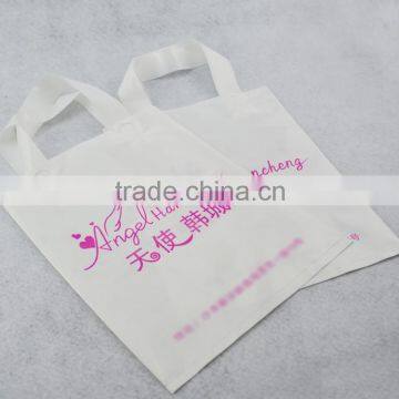 custom design LDPE patch handle heat sealing die cut bag with pink printing for shopping