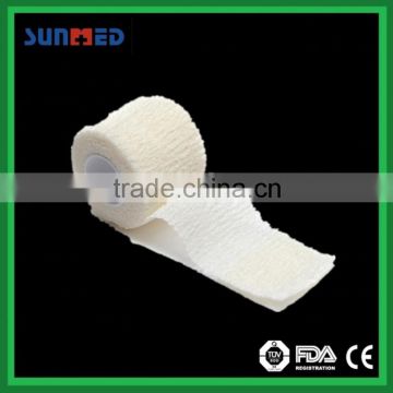 Combined gauze cohesive bandage