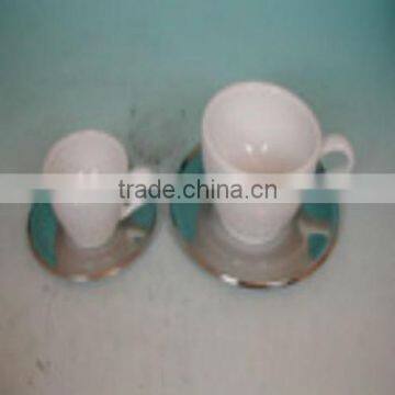 ceramic cup with stainless steel saucer