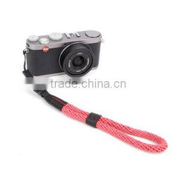 Cotton various color camera strap with leather hand strap.