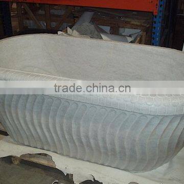 carved marble bath tub