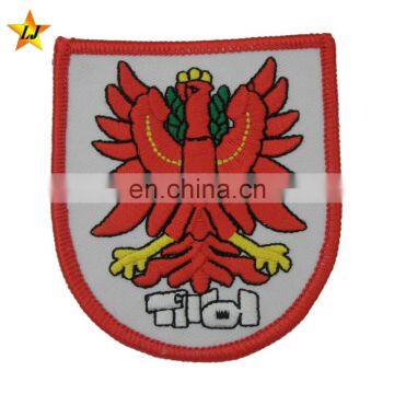 Hot sale factory direct price free logo embroidery patch/woven patch/label