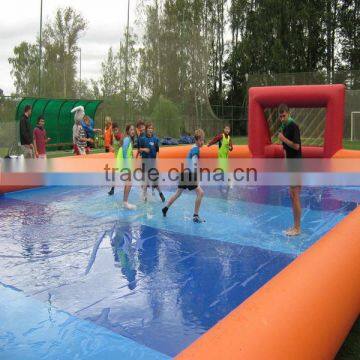 2014 world cup soap water inflatable football field for teamwork