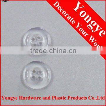Transparent plastic button