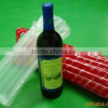 red plastic wine bottle air bag