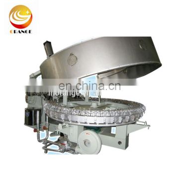 Industrial ice cream cone making machine on other food processing machine