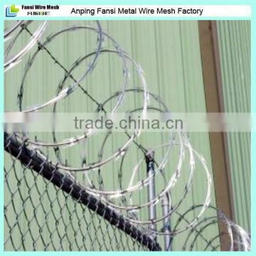 Hot dip galvanized cyclone wire fence with razor wire top