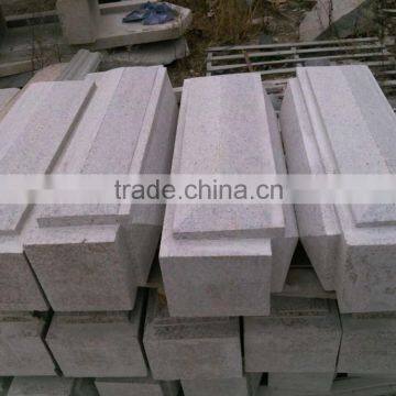 grey granite square and wayside curbs