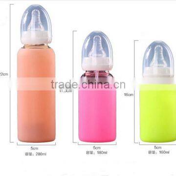 Low price custom brand 160ml/180ml/280ml glass feeding bottle,candy color sleeve glass feeding nipple bottle
