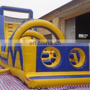 giant blue/yellow inflatable obstacle course