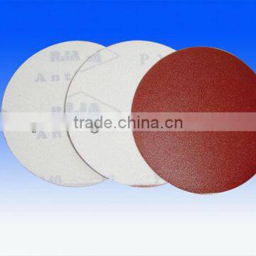 Red round hook and loop disc for polishing wood