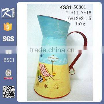 Colorful painted decorative metal watering can